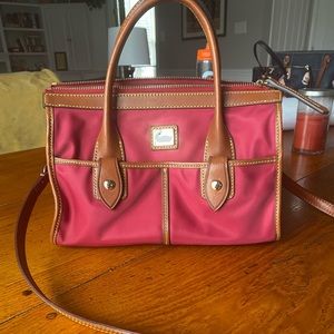 Dooney and Bourke red nylon satchel crossbody.  In great condition.